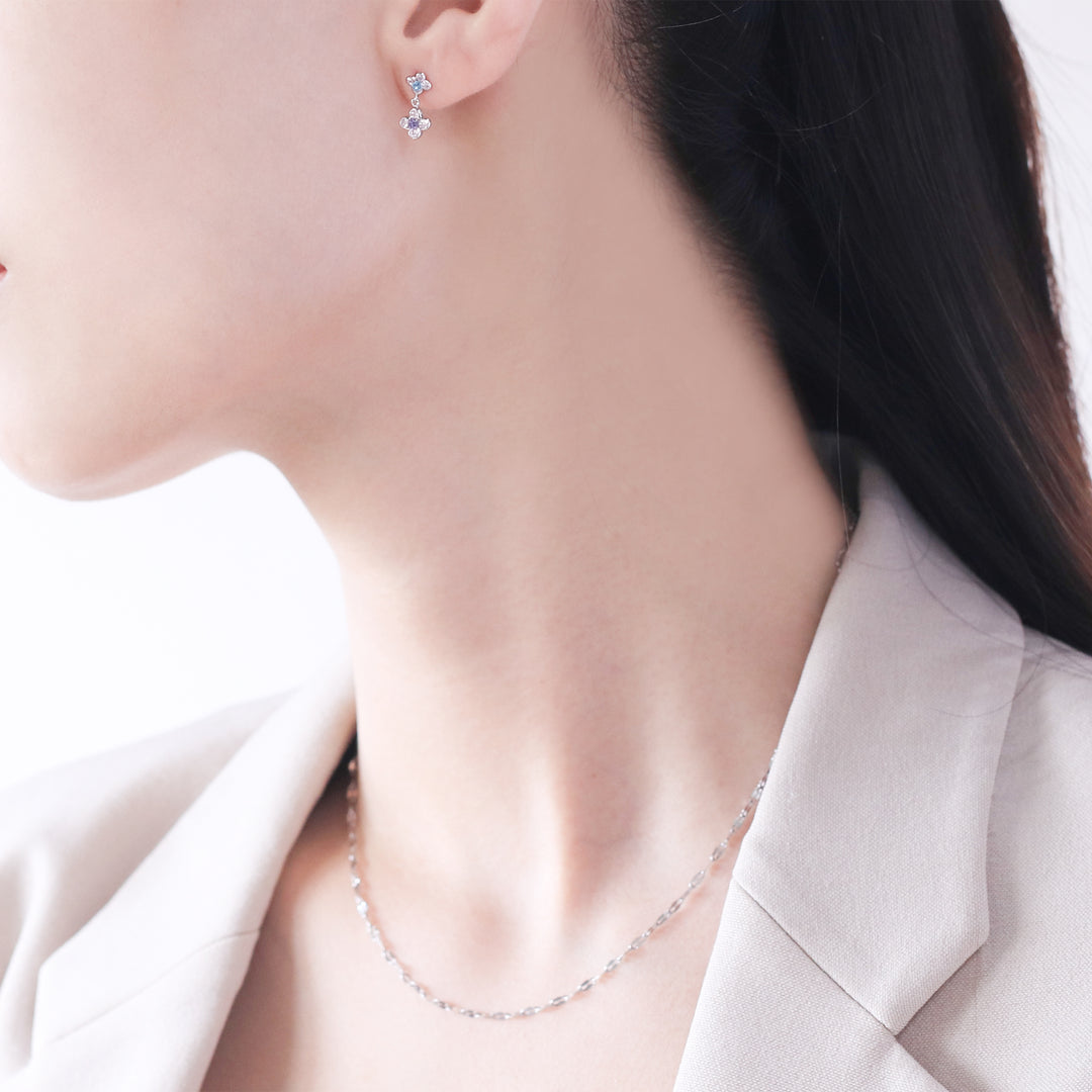 ホワイトゴールドリーフフラワークリップピアス 11月誕生石 K10 ホワイトゴールド ブルートパーズ フラワー