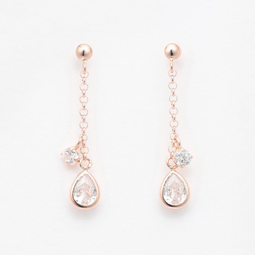 e.m.イーエム　サイドジルコニアピンクゴールドピアス　SILVER e.m.（イーエム）の「SILVER925ジルコニア×スタッズピアス M